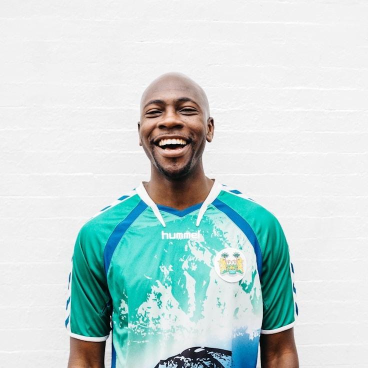 Kaveri Mehta, Lead Design Curator at OpenPathStructure, reviewing corporate floral arrangements